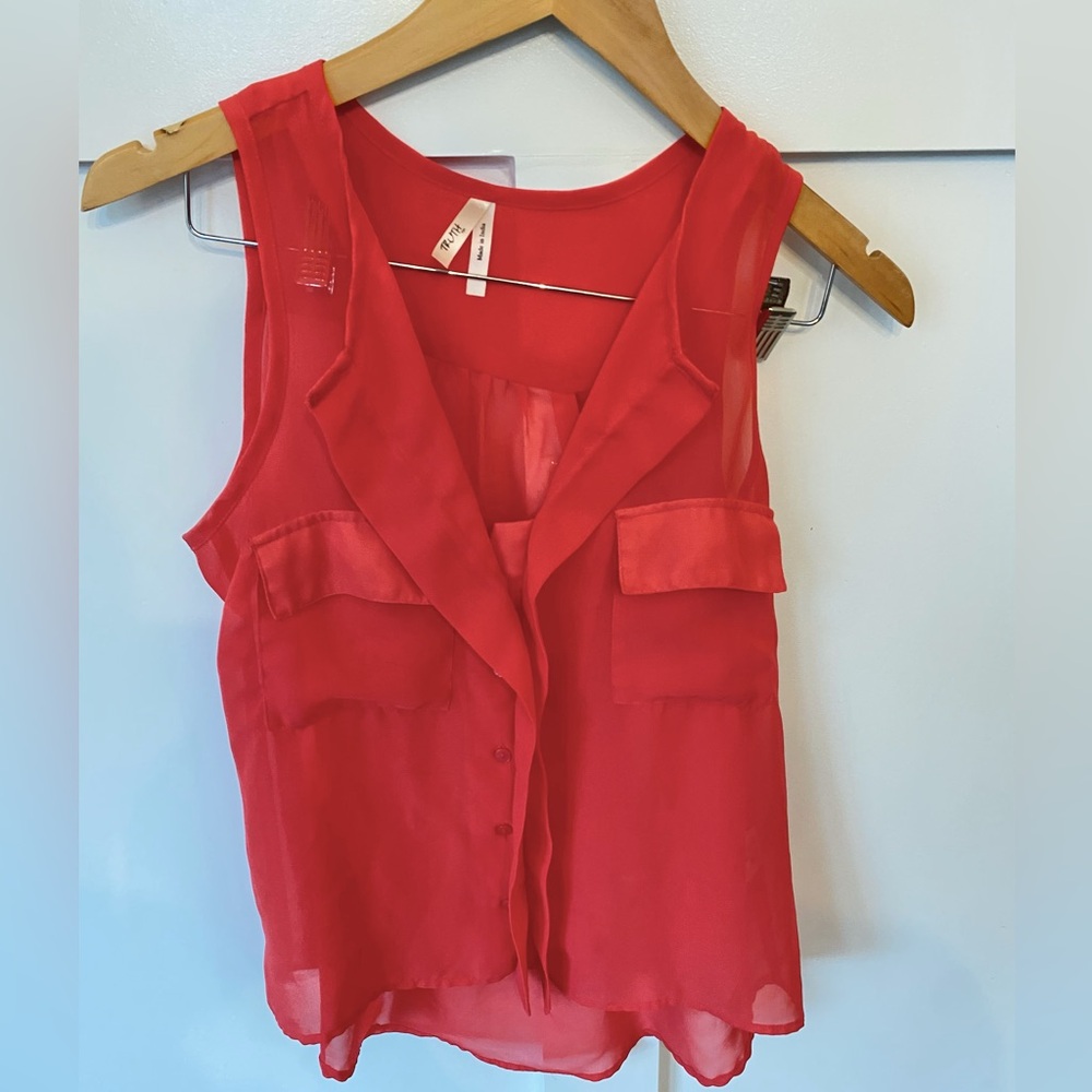 Sheer pink tank top with pocket detail